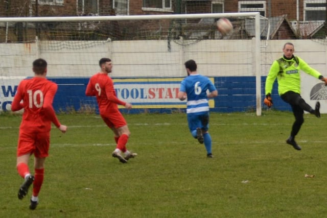 Glasshoughton Welfare goalkeeper Mark Bower comes out of goal to clear the ball.  Picture: Rob Hare