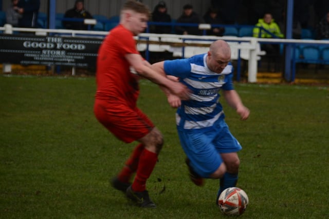 Glasshoughton Welfare's Matt Cunliffe takes on a Selby Town player. Picture: Rob Hare