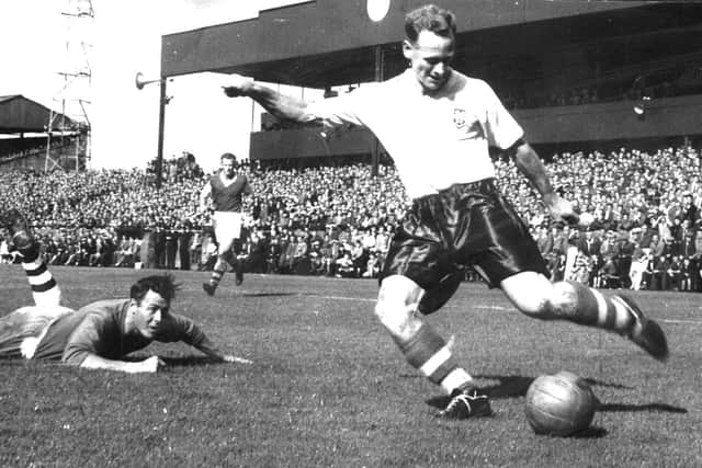 Sir Tom Finney displays his skills playing for Preston North End at Deepdale