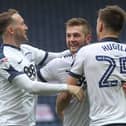 Tom Barkhuizen (centre) celebrates after scoring his side’s third goal against Reading in March 2017