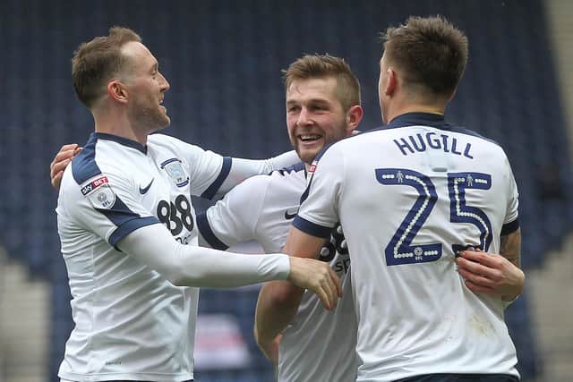 Tom Barkhuizen (centre) celebrates after scoring his side’s third goal against Reading in March 2017