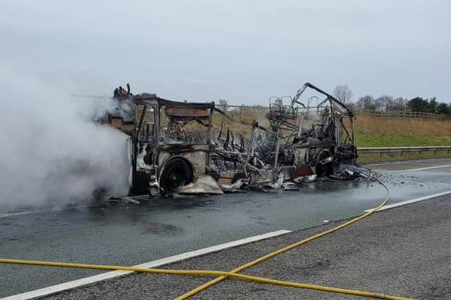 A double-decker bus burst into flames on the M58 southbound (Credit: National Highways)