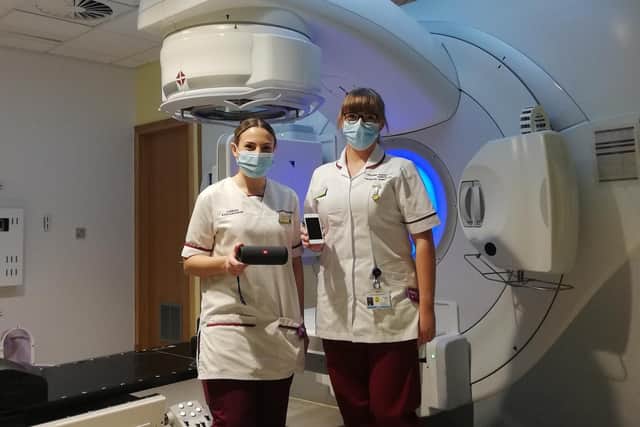 Therapeutic radiographers Olivia Ashby and Victoria Miller at Rosemere Cancer Centre with the new music equipment