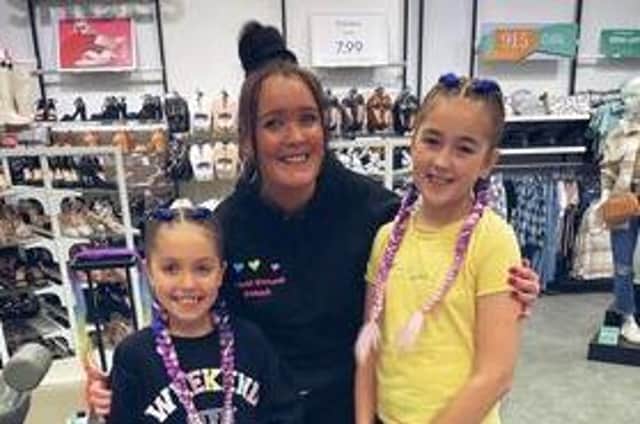Gemma Brown with two of her clients after braiding their hair at her pop-up shop in Chorley New Look.