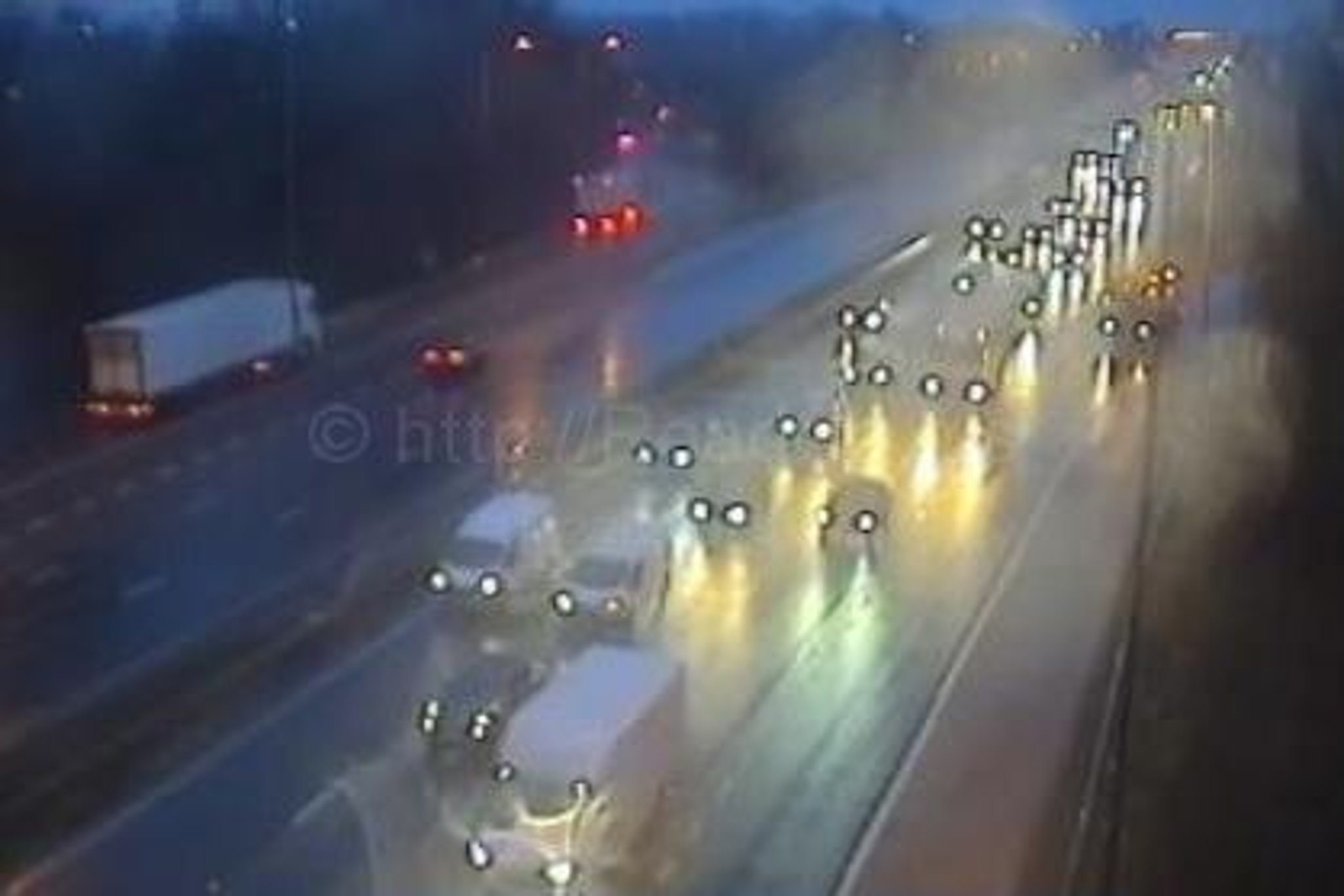 M6 closed with long delays between Preston and Wigan after lorry catches fire and crashes into bridge
