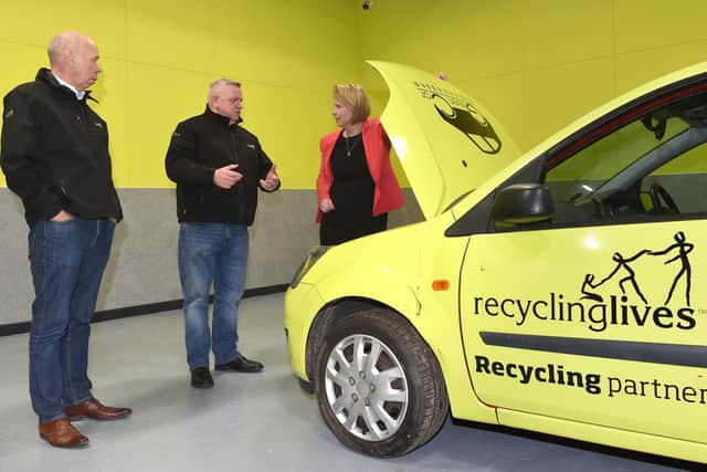 Recycling Lives has opened a new training facility at its Braconash Road site in Leyland.
Katherine Fletcher, the Conservative MP for South Ribble, is pictured with one of the vehicles used to train Recycling Lives employees how to depollute end of life vehicles. The MP is pictured with (left to right) Recycling Lives’ Executive Chairman Andrew Hodgson and CEO Gerry Marshall.
