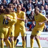 Preston players celebrate Simon Whaley’s winning goal at Coventry in April 2006