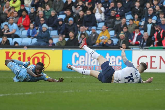 Preston North End striker Emil Riis is brought down by Coventry City's Fankaty Dabo for the penalty