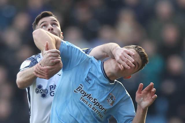 PNE defender Andrew Hughes battles with Coventry striker Viktor Gyokeres