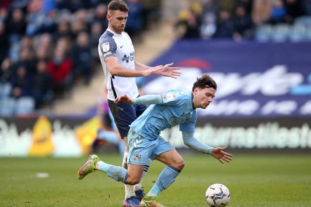 Preston North End’s Ben Whiteman (left) and Coventry City’s Callum O’Hare battle for the ball
