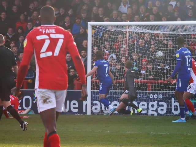 Aaron Wildig heads Morecambe into the lead