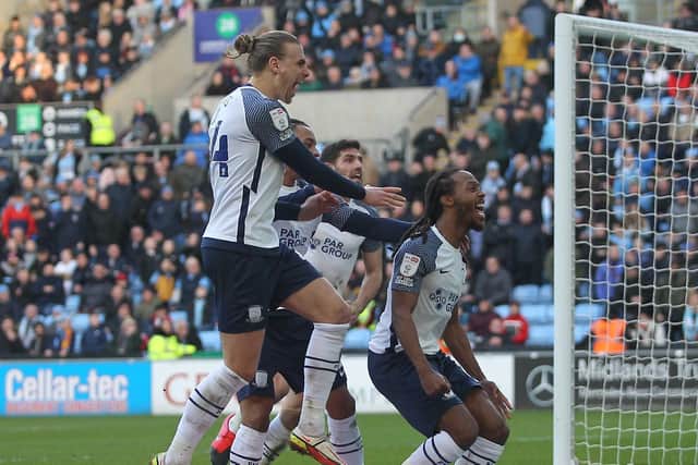Daniel Johnson celebrates with the PNE fans after scoring against Coventry