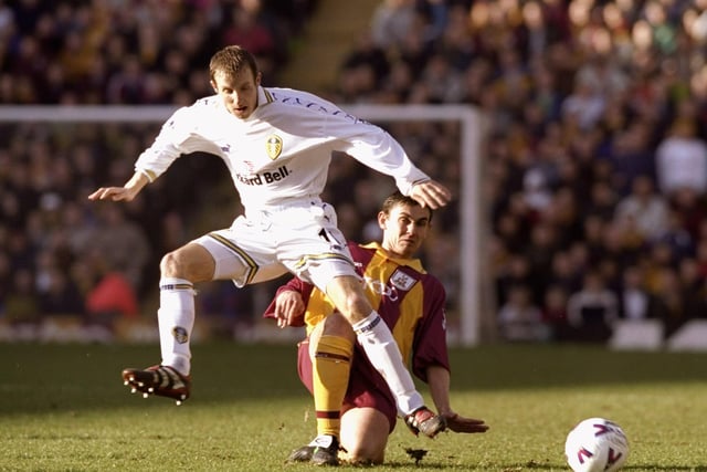 Lee Bowyer skips over a challenge from Bradford City's Gareth Whalley.