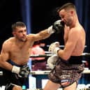 Jack Catterall lands a left hand on Josh Taylor - a familiar sight on Saturday night