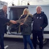 Chorley residents collecting their free tree from Councillor Alistair Bradley - Leader of Chorley Council (second from right) and Councillor Mark Clifford - Champion for Environment and Green Space (left)
