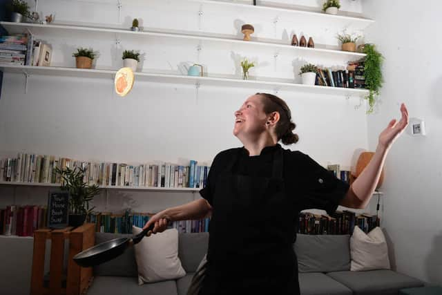 Jennifer Blain making pancakes at Town House Coffee and Brew Bar