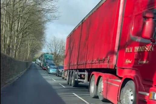 ... along Dawson Lane, which was brought to a standstill (image: Peter Love)...