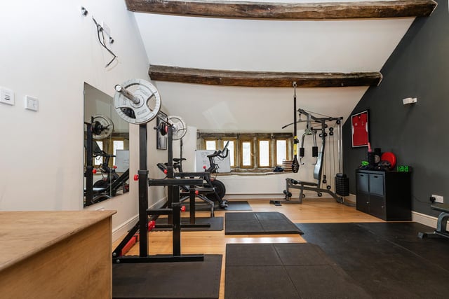 A home gym, complete with character beams.