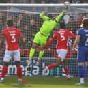 Morecambe keeper Trevor Carson was called into action early on