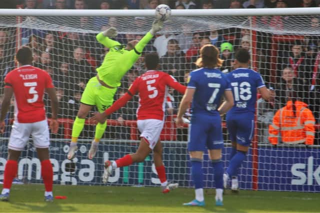 Morecambe keeper Trevor Carson was called into action early on