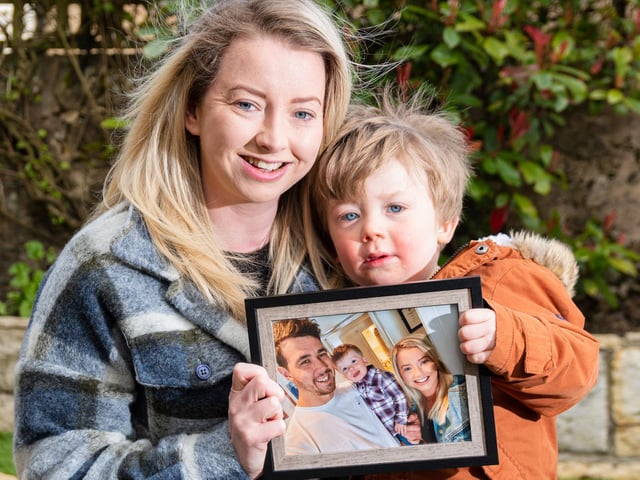 Danielle and Arlo pictured with a favourite family photo
