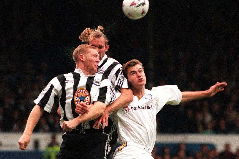 David Wetherall tries to win the header despite the attention of Newcastle United's Darren Peacock and Steve Watson during the Premier League clash at Elland Road in September 1996.