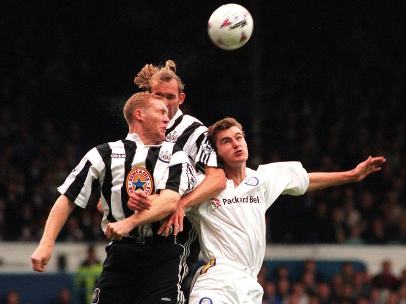 David Wetherall tries to win the header despite the attention of Newcastle United's Darren Peacock and Steve Watson during the Premier League clash at Elland Road in September 1996.
