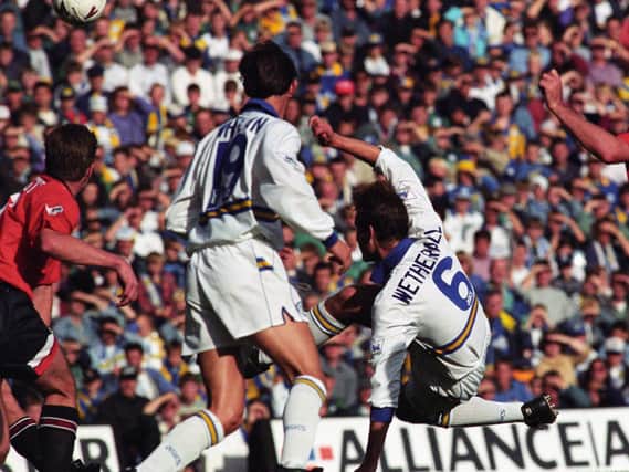 David Wetherall scores against Manchester United at Elland Road in September 1994. Brian Deane also scored in a 2-1 win. PIC: Varley Picture Agency