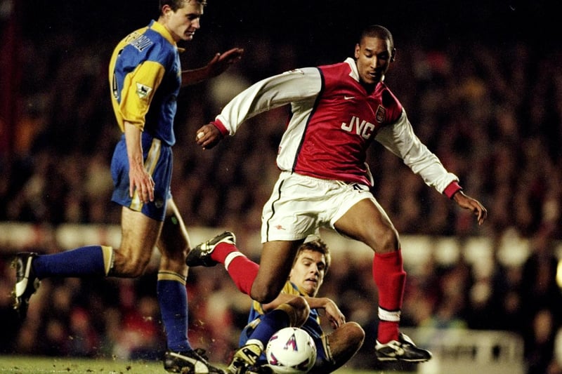 David Wetherall hunts down Arsenal's Nicolas Anelka during the Premiership clash at Highbury in December 1998.