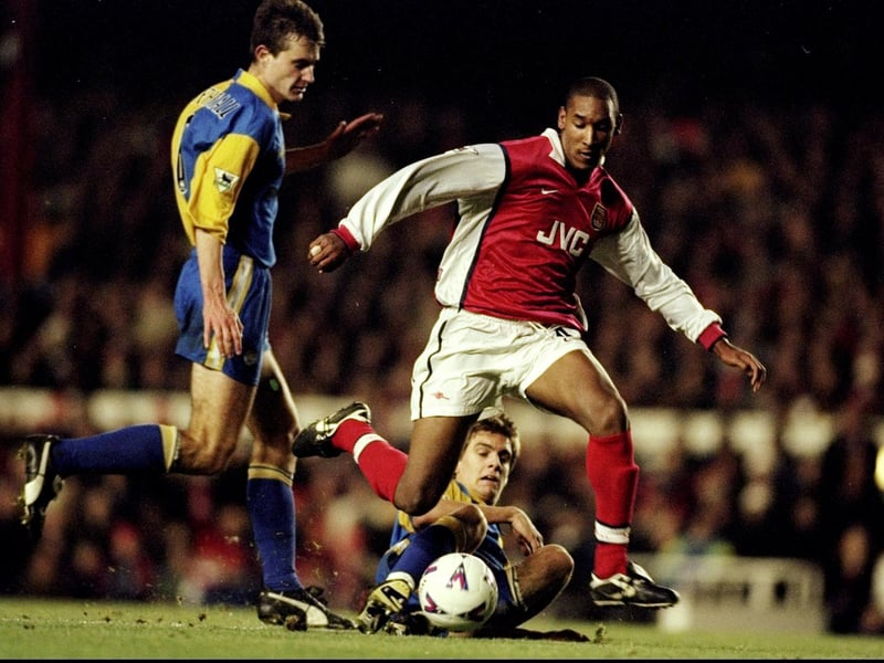 David Wetherall hunts down Arsenal's Nicolas Anelka during the Premiership clash at Highbury in December 1998.