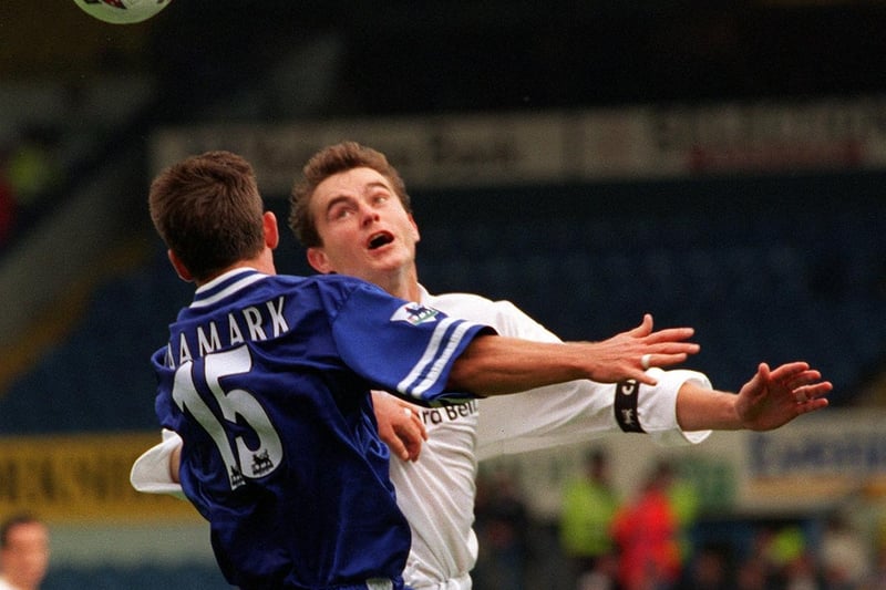 David Wetherall tussles with Leicester City's Pontus Kaamark dueing the Premier League clash at Elland Road in September 1997. The Foxes won 1-0.