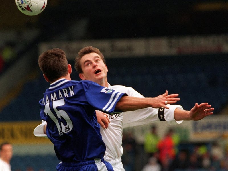 David Wetherall tussles with Leicester City's Pontus Kaamark dueing the Premier League clash at Elland Road in September 1997. The Foxes won 1-0.