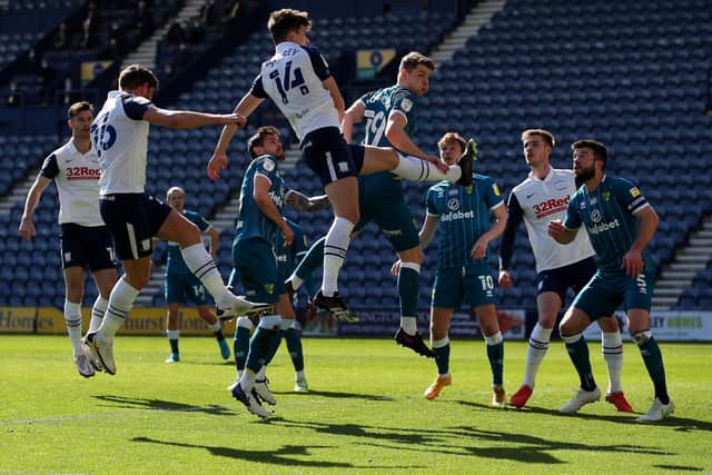 Jordan Storey goes up for a header against Norwich at Deepdale on Good Friday