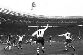 Doug Holden (No.11) scores for PNE against West Ham in the 1964 FA Cup final at Wembley