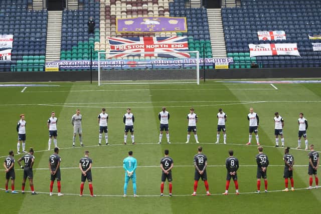 Preston North End and Brentford players observe a two minute's silence in honour of Prince Philip, Duke of Edinburgh
