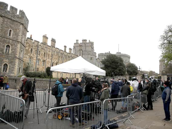 Media outside Windsor Castle, Berkshire, following the announcement on Friday April 9, of the death of the Duke of Edinburgh at the age of 99. Picture date: Saturday April 10, 2021. Picture: Steve Parsons/PA Wire