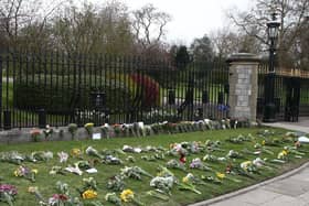 Flowers left by Cambridge Gate at Windsor Castle, Berkshire, following the announcement of the death of the Duke of Edinburgh at the age of 99. Picture date: Saturday April 10, 2021. Picture: Gareth Fuller/PA Wire/PA Images