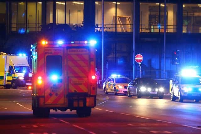 Emergency services arrive close to the Manchester Arena on May 23, 2017