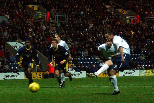 Graham Alexander scores from the penalty spot for PNE against Wimbledon