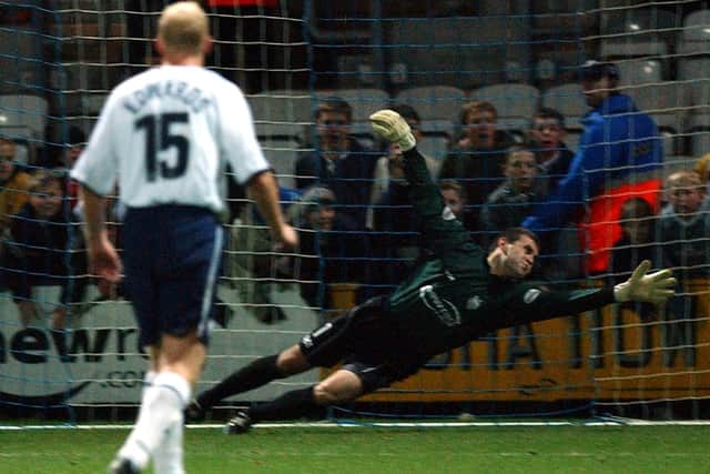 PNE defender Rob Edwards watches as goalkeeper David Lucas is beaten from the penalty spot against Wimbledon at Deepdale