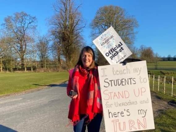 A protester at the picket outside Stonyhurst College this morning. Further strike action has been planned.