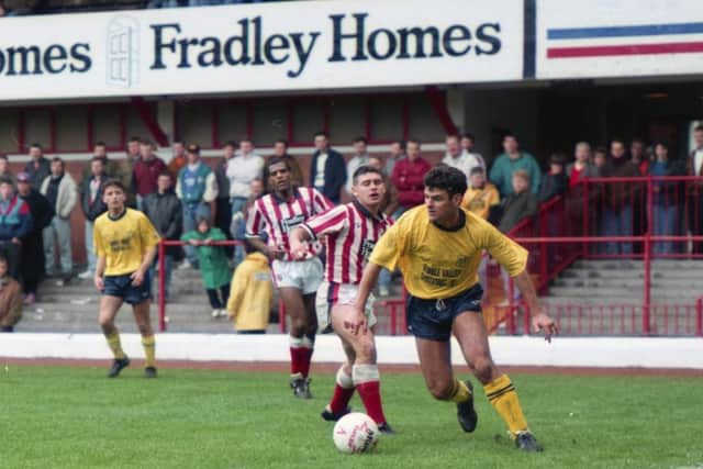 PNE's Ian Bogie goes past a Stoke defender at the Victoria Ground