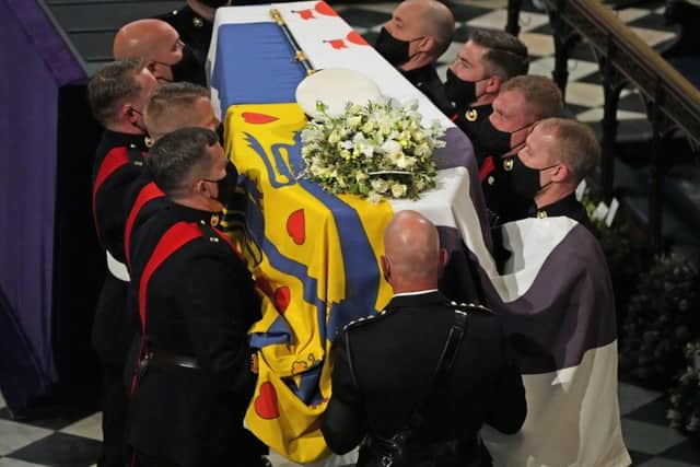 The Duke of Edinburgh's coffin, covered with His Royal Highness's Personal Standard in St George's Chapel, Windsor Castle