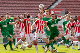 Alan Browne and Sepp van den Berg in the thick of the action