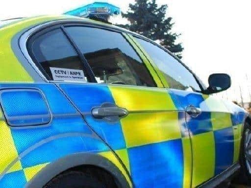Two Lancashire Police officers have been forced to apologise after they were filmed kissing each other in a Tesco car park in Blackburn