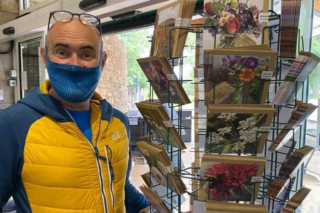 He has raised more than £15,000 in three months from selling his cards in Booths