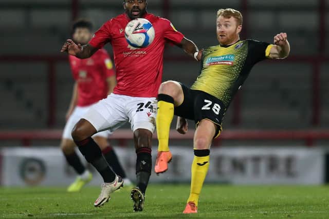 Yann Songo'o scored Morecambe's second goal at Grimsby Town