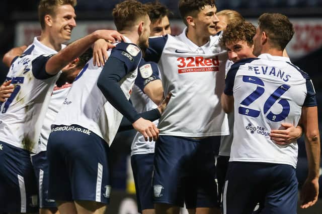 Ryan Ledson (second right) is mobbed by his Preston North End team-mates after scoring the third goal against Derby County at Deepdale