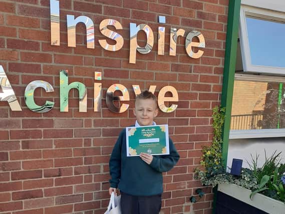 Ingol pupil Reece Hamilton Heath walked two miles every day throughout March and raised just short of £1,000. He won an award for his efforts.