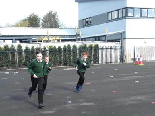 Ingol CP pupils going the extra mile in the school playground as part of their fundraiser.
